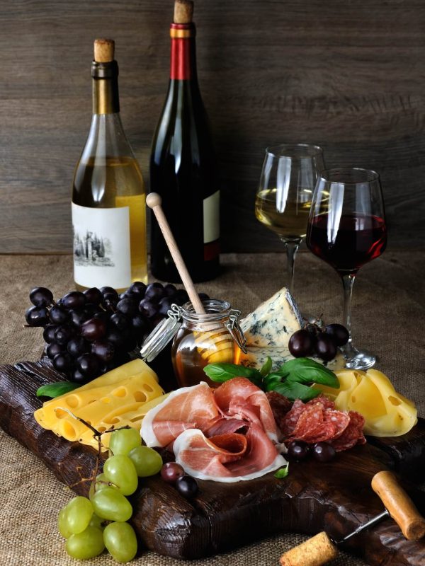 antipasto-catering-platter-with-jerky-bacon-prosciutto-salami-cheese-and-grapes.jpg